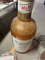 Inflated Mattingly & Moore bourbon half-gallon blowup bottle, shows label details and size.