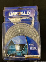 Clear Emerald 30 ft rope light in packaging showing length and exterior use image