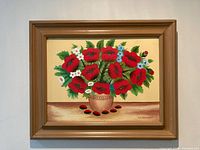 Front view of oil painting showing vibrant red poppies and other flowers in a pot against a plain background.