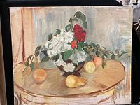 Oil painting showing a still life composition with flowers and fruit on a wooden table