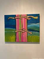 Photo showing acrylic painting of a stylized pine tree with pink and green trunk and three abstract branches, background of blue sky and green hills, signed on back with title and artist name, dimensions approx. 14x18 inches.