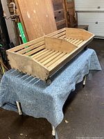 View of solid maple utility cart showing overall structure, compartments, and casters.