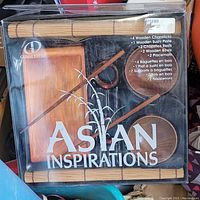 Photo of the sealed box of the Asian Inspirations sushi set showing all included items and packaging