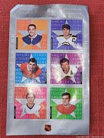Photo of NHL All Stars hockey player stamps mounted on original backing card