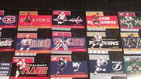 Photo showing 20 die-cut hockey cards from the 2015-16 Upper Deck Tim Hortons Die Cuts set, each card representing an NHL team and player with team logos and player action images.