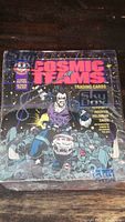 Front view of the sealed DC Cosmic Teams trading card box showing artwork and product text including hologram card information.