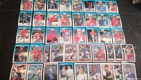 Full lot of 43 Montreal Expos baseball cards arranged in rows, showing various players including multiple Gary Carter cards.
