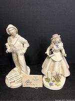 Two Originals by Elfriede Meindl signed ceramic figurines; lobster fisherman and Anne, with artist card