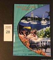 Front cover of the Bahamas Coin and Bill Collection pack showing scenic images of flamingos, boats, lighthouse, and colonial buildings.