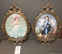 Pair of vintage ornate metal framed pictures Pinkie and Blue Boy side by side, showing overall condition and size.