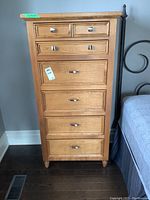 Front view of entire dresser showing six drawers and overall condition