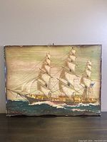 Front view of the wooden block with the J. O'Hara Cosgrave sailing ship print showing a detailed classic ship with multiple sails and rigging.