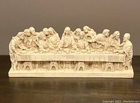 Front view of The Last Supper resin statue showing all thirteen figures seated around the table in detailed sculpting.