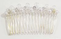 Top view of the David Tutera hair comb showing the arrangement of pearls and crystals along silver-tone metal prongs.
