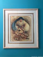 Full view of the framed wall art showing a woman making vases.