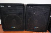 Pair of two black Yorkville Y115 Performance Series speakers side by side with visible wear on the grille and corners.