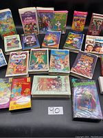 Overview of classic VHS tapes including Disney animated titles, Bugs Bunny, Tom and Jerry, and children's shows.