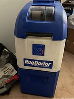 Front view of Rug Doctor Mighty Pro X3 unit showing model label