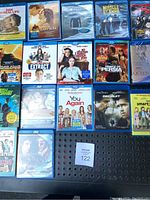 Blu-Ray movie collection spread out showing variety of movie titles and colorful cover art