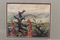 Close-up of one autumn landscape painting replica with red and purple foliage, showing detail of brushstroke style and color palette.