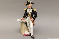Front angle of Royal Doulton figurine The Captain HN-2260 showing the captain in detailed uniform.