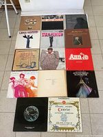 Collection of vintage vinyl LP albums arranged on floor