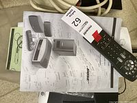 Remote control and user manuals laid out