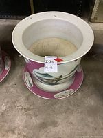 Angled top view of planter pot and saucer showing interior depths and exterior color