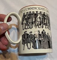 Side view of Wedgwood mug showing detailed illustrations of English monarchs and commemorative text.