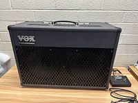 Front view of Vox Valvetronix amplifier and footswitch pedal