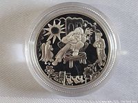 Close-up front view of the 2002 Canadian silver half dollar coin inside the protective capsule showing detailed artwork.