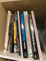 Top shelf showing 9 books mainly on art, anatomy and sculpture subjects.