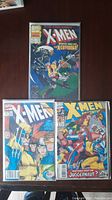 Photo showing all three vintage X-Men comic books laid out: The Uncanny X-Men #17 (top), X-Men Annual #17 (bottom left), and X-Men Adventures #3 (bottom right).
