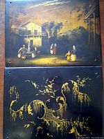 Two antique enamel and gilt copper panels displayed vertically, one showing a rural scene and the other a gilt decorative pattern, both with corner holes visible.