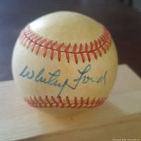Close-up of Whitey Ford signature on the baseball.
