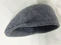 Grey men's wool hat, side angle showing shape and fabric texture
