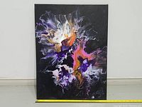 Frontal view of the abstract acrylic painting on canvas showing the full artwork and size scale with measuring tape.