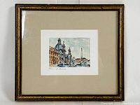 Framed miniature painting showing detailed view of the north end of Piazza Navona with Fountain of the Moor in front. Wide beige mat and dark wood frame with gold detailing.