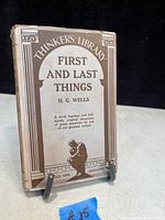 Front cover of the book 'First and Last Things' by H.G. Wells showing the dust jacket with title and author.