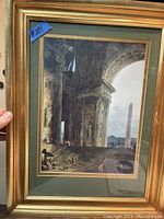 Full view of vintage architectural print in gilded wood frame, showing classical ruins and an obelisk.