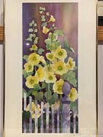 Framed original watercolor painting by David McKee showing yellow flowers, white picket fence, and purple background.
