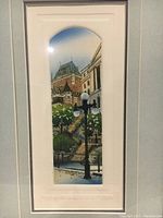 Close-up of the framed etching showing detail of the artwork including a street lamp, stairs, and buildings in a vertical arch shape.