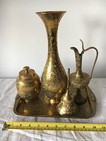 Full coffee and tea set showing all pieces on tray with measuring tape indicating size.