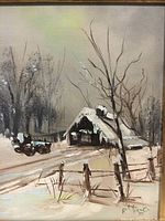 Close-up photo of the oil painting showing a snow-covered cottage, bare trees, and the signature R. Yoong at the bottom right.