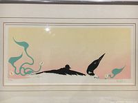 Framed limited edition artist proof lithograph of Aboriginal artwork with pastel background and black silhouette design, signed and numbered.