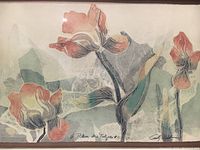 Close-up of the pressed pastel tulip painting showing the signature and floral details.