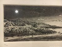 Close up of the etching showing detailed coastal scene and edition number 10/100.