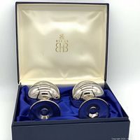 Four silver-plated brass goblets in original Birks box with navy outer and blue satin inner lining