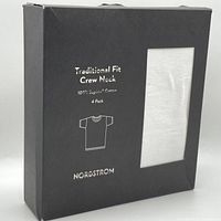 Front of black Nordstrom box featuring product name, traditional fit crew neck t-shirts, 4-pack, 100% Supima cotton, with a clear window showing a white t-shirt inside.