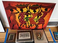 Overview of four pieces of art including a large painting, two framed prints, and a woven textile.